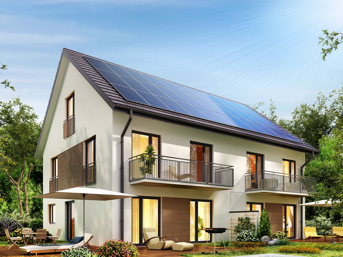 Rooftop solar panels installed on a two-story townhome. Rooftop solar panels installed on a two-story townhome.